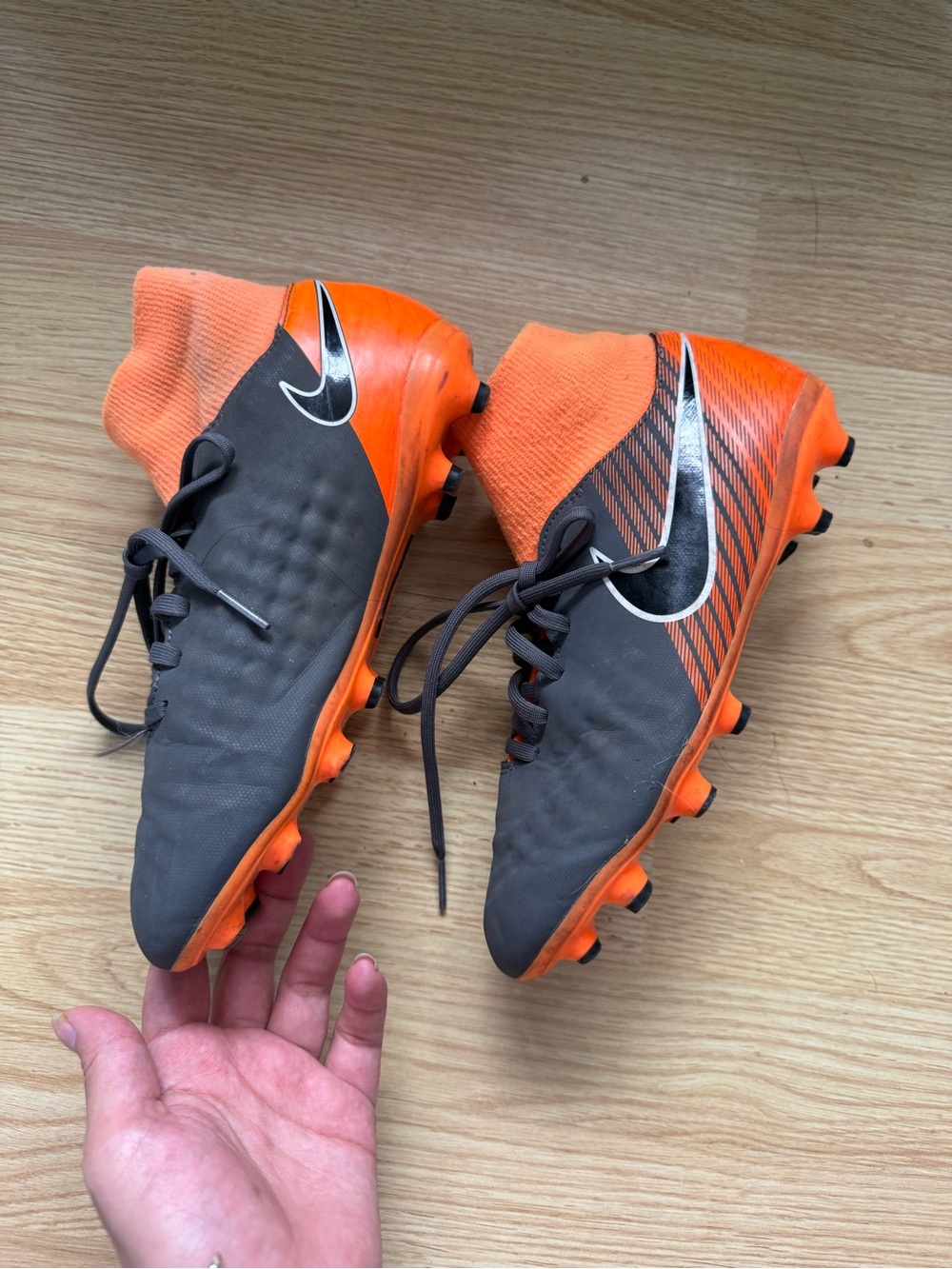 Nike Black and Orange High-Top Soccer Cleats